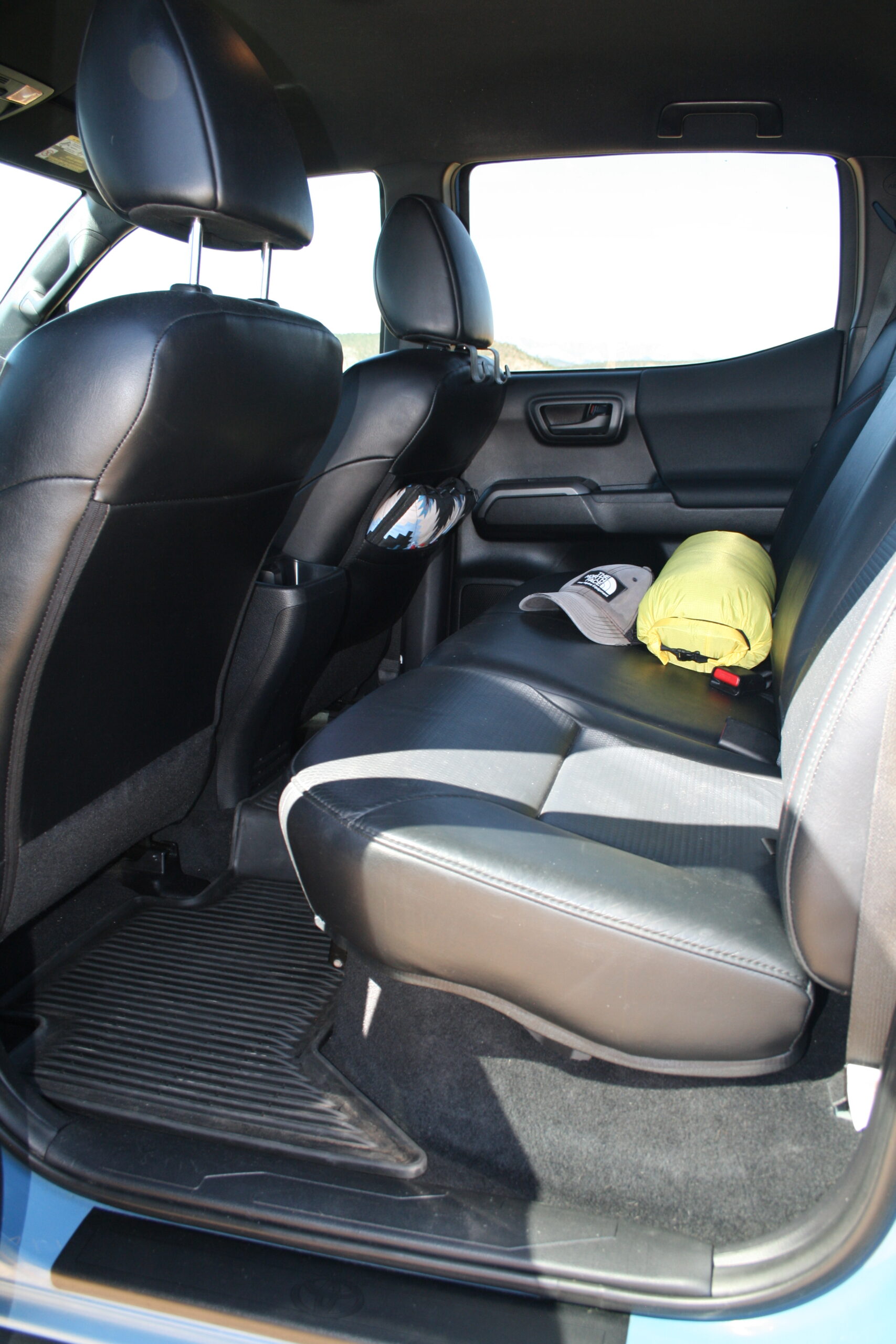2018 Tacoma TRD Pro rear cab interior with North Face sleeping bag on back seat