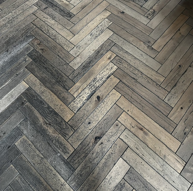 Reclaimed wood herringbone floor Death and Co Denver Ramble Hotel